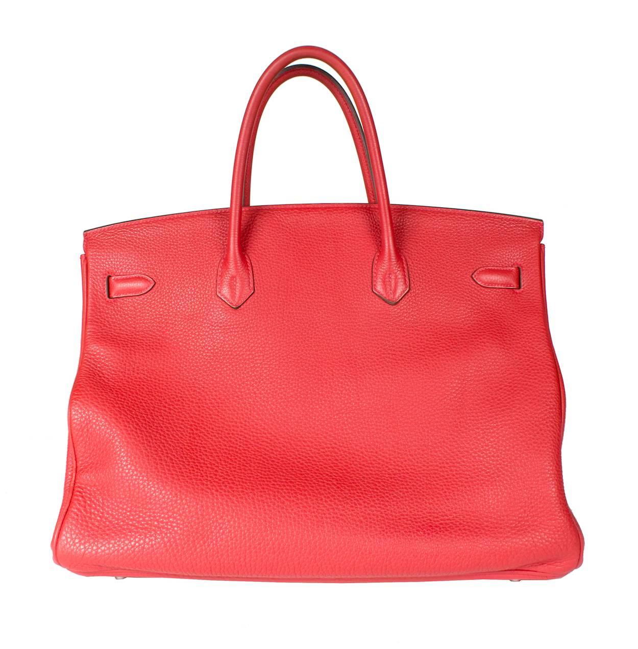 This is a 40cm Birkin bag by Hermes from 2012.  It is in geranium red togo leather.  It includes a dust bag, lock and key, and a raincoat.

4
