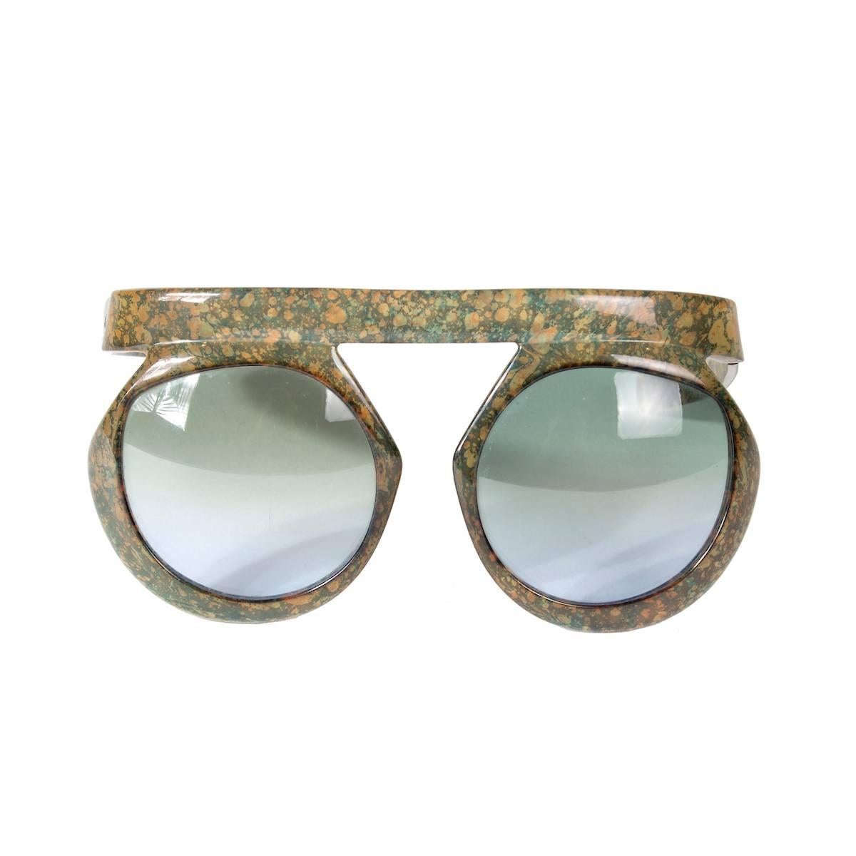 These are a pair of sunglasses by Christian Dior from the 1970s.  They are called the 