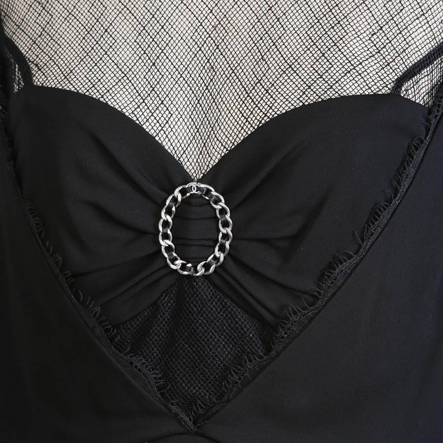 Chanel Black Dress with Mesh Neckline and Ring Medallion In New Condition In Los Angeles, CA