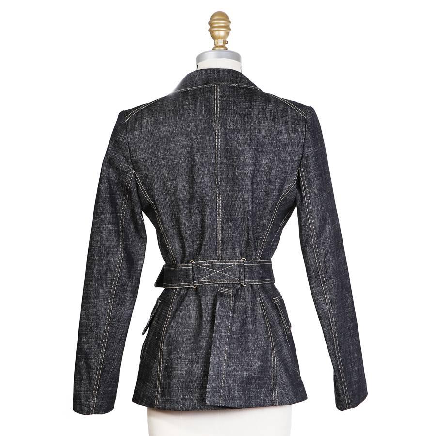 This is a denim blazer by Alaia.  It is made from a dark unwashed denim and features contrast stitching and 4 front pockets.  Single breast closure in front with 4 buttons and includes a belt.

Retailed for $4285

15.5