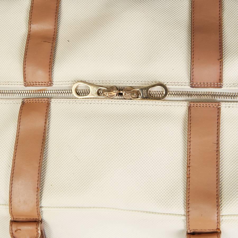 cream duffle bag