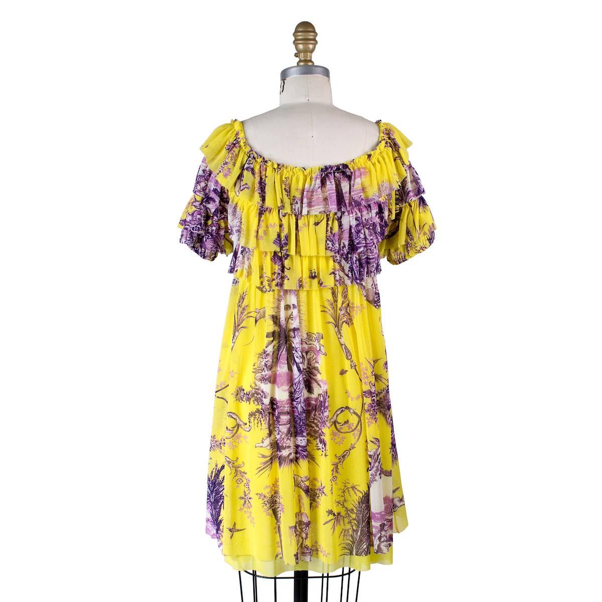 Top from Jean Paul Gaultier Soleil.  Features yellow and purple print with ruffles.  Empire waist.

100% Nylon/polyamide (has stretch)