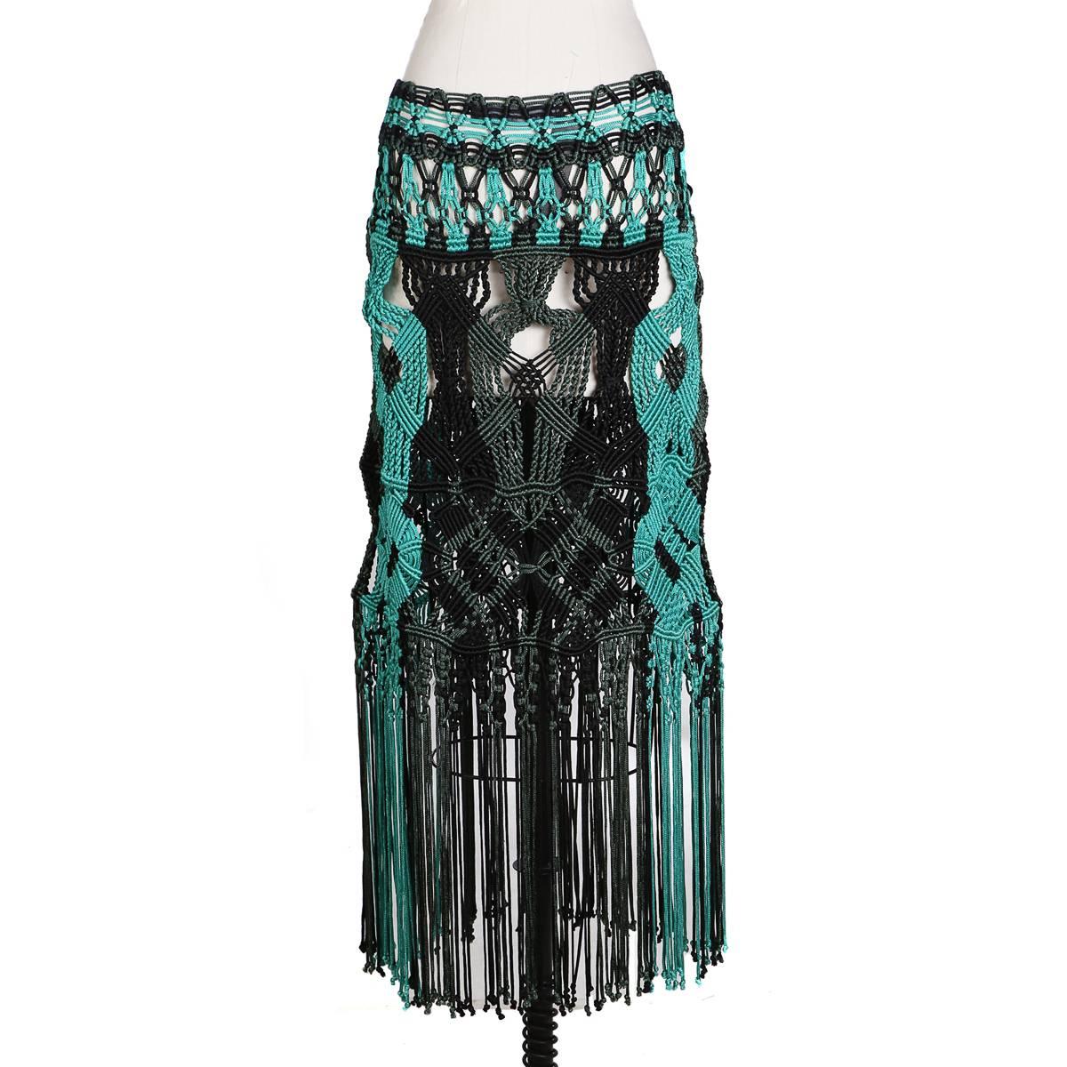 This is a skirt from Proenza Schouler.  Crochet knit with fringe and side hook and eye closures.