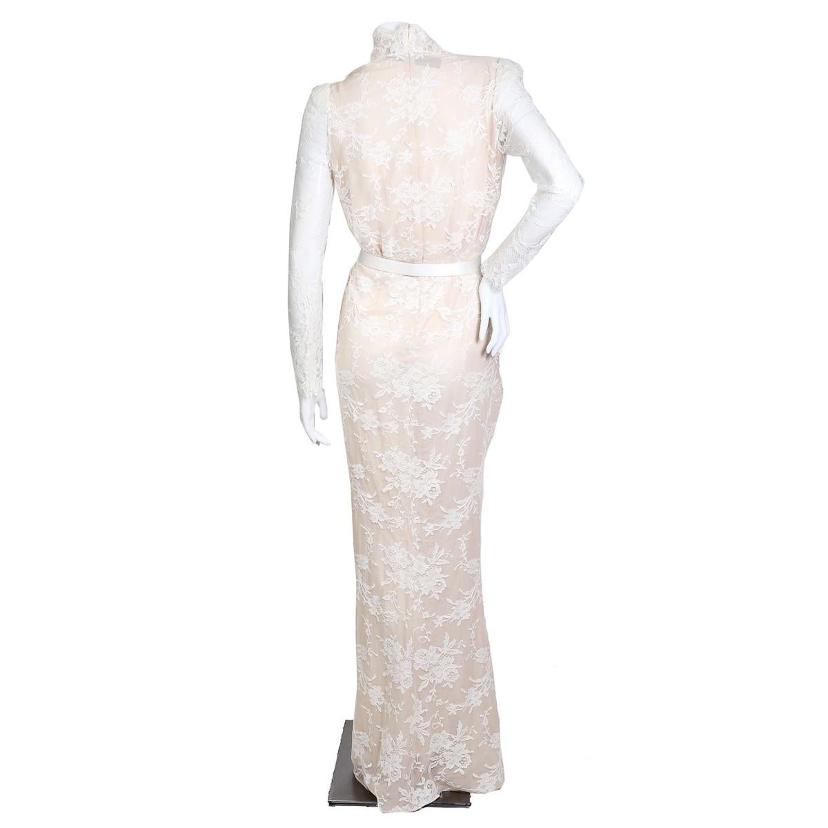 Gown from Alexander McQueen
White lace with nude lining
Long sleeves
Includes white satin belt with a rainbow jewel sun emblem
Back zipper closure and zipper cuffs
Condition: Excellent
Size/Measurements:
Size 42
15