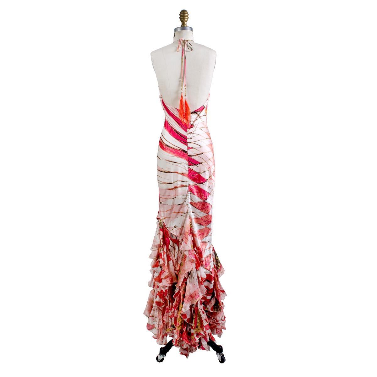 Gown by Roberto Cavalli for the S/S 2004-2005 collection
Halter neckline 
Reptilian effect pattern in coral tones
Asymmetrical ruffles along bottom
Silk with tiny gold metallic accents
Condition: Excellent
Size/Measurements:
Size small
30