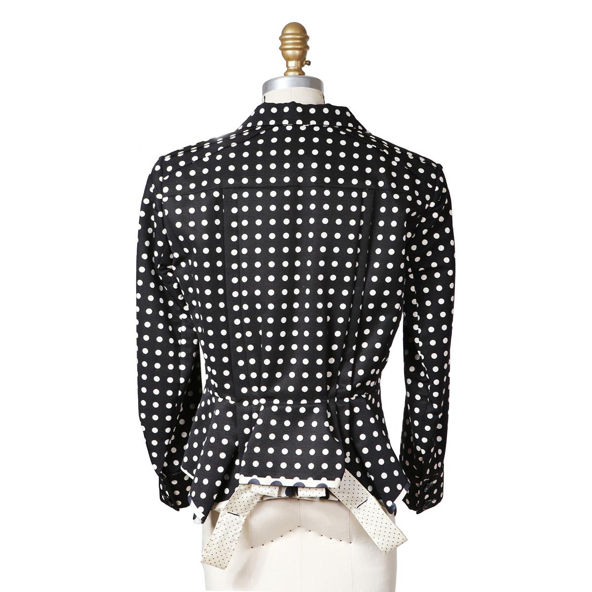 Jacket by Stefano Pilati for Yves Saint Laurent circa 2000s
Hidden button closure in front
Two different sized polka dot patterns 
Hanging straps along bottom
Cinched waist peplum
Condition: Excellent
Size/Measurements:
Size 36
36