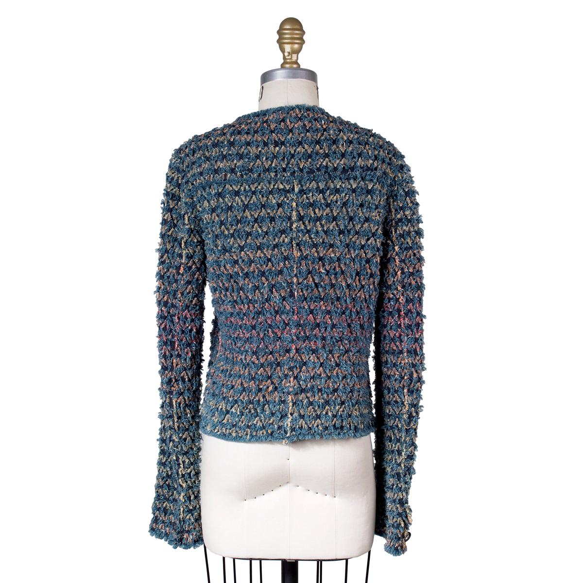 Jacket by Chanel for the Spring 2007 collection
Blue denim with interwoven fray
Two waist pockets in front
Button closure down front
Cotton
Condition: Excellent
Size/Measurements:
Size 34
35