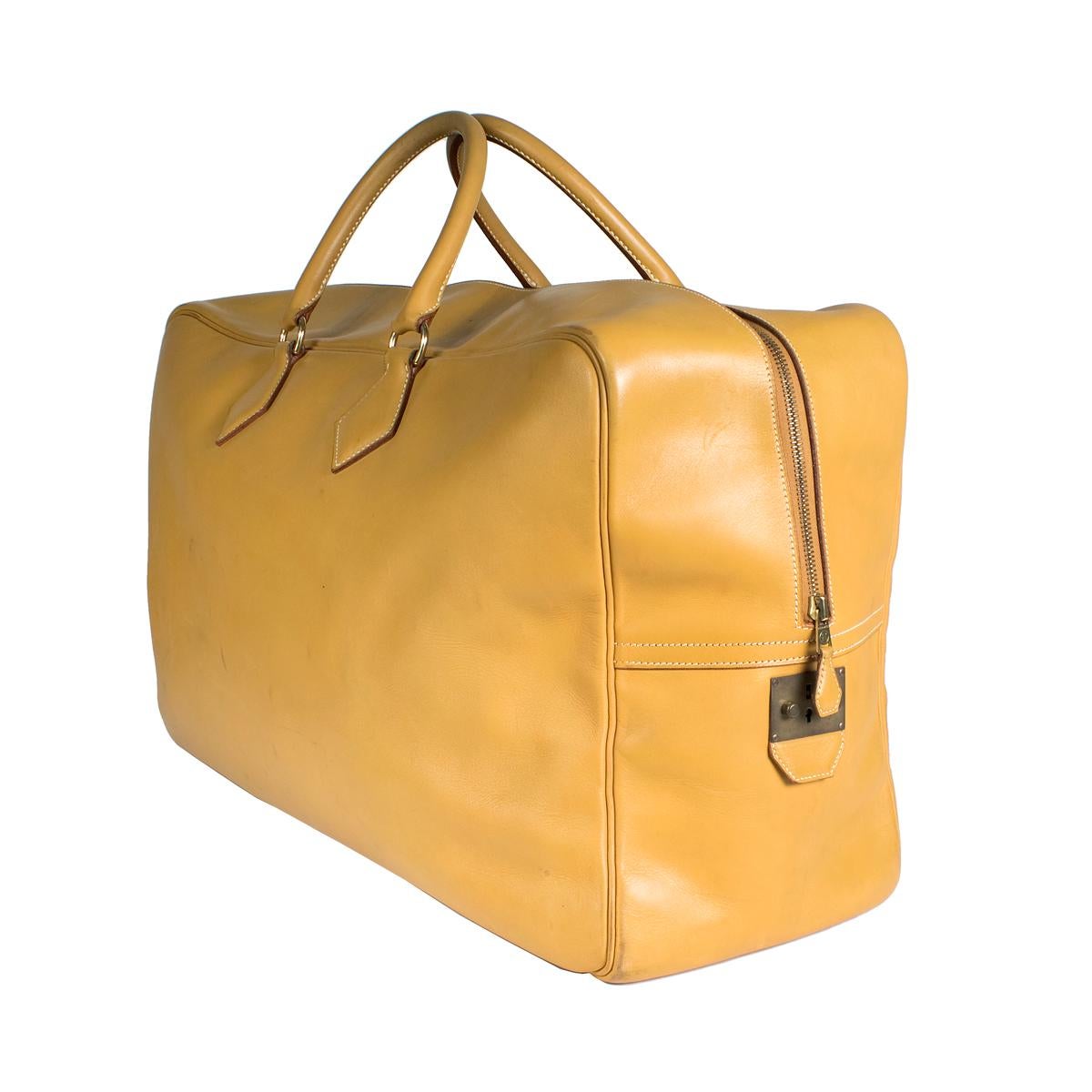 Travel duffle tote by Hermes from 1993
Zipper closure 
Two top handles
Dimensions:  20