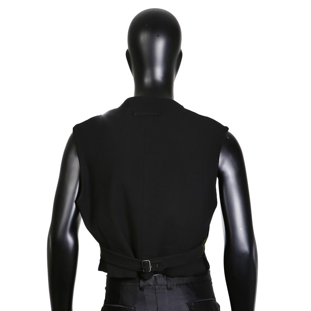 Men's vest by Jean Paul Gaultier
Green, orange, and black velveteen diamond pattern in front
Button closure in front
Back cinch
Condition: Excellent

Size/Measurements:
Size 50 (EU)
21