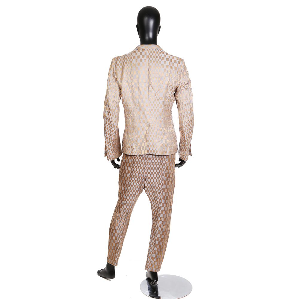 Men's suit by Haider Ackerman
Features a gold and grey checkered pattern in an oscillating/warped effect 
Linen and silk blend
Pants have a cropped and tapered fit with a drop crotch silhouette
Condition: Excellent

Size/Measurements:
Jacket:
Size