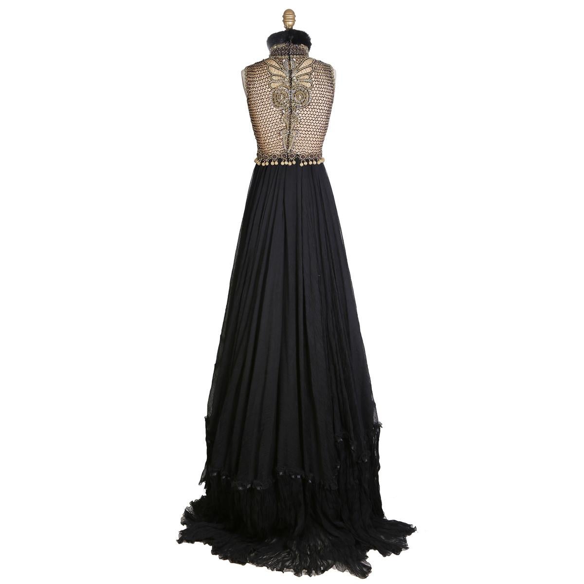 Vintage gown by Gianfranco Ferre
Chiffon with beaded netting
High fur collar
Includes separate black underskirt
Back zipper closure
Condition: Excellent vintage condition

Size/Measurements:
Italian size 42