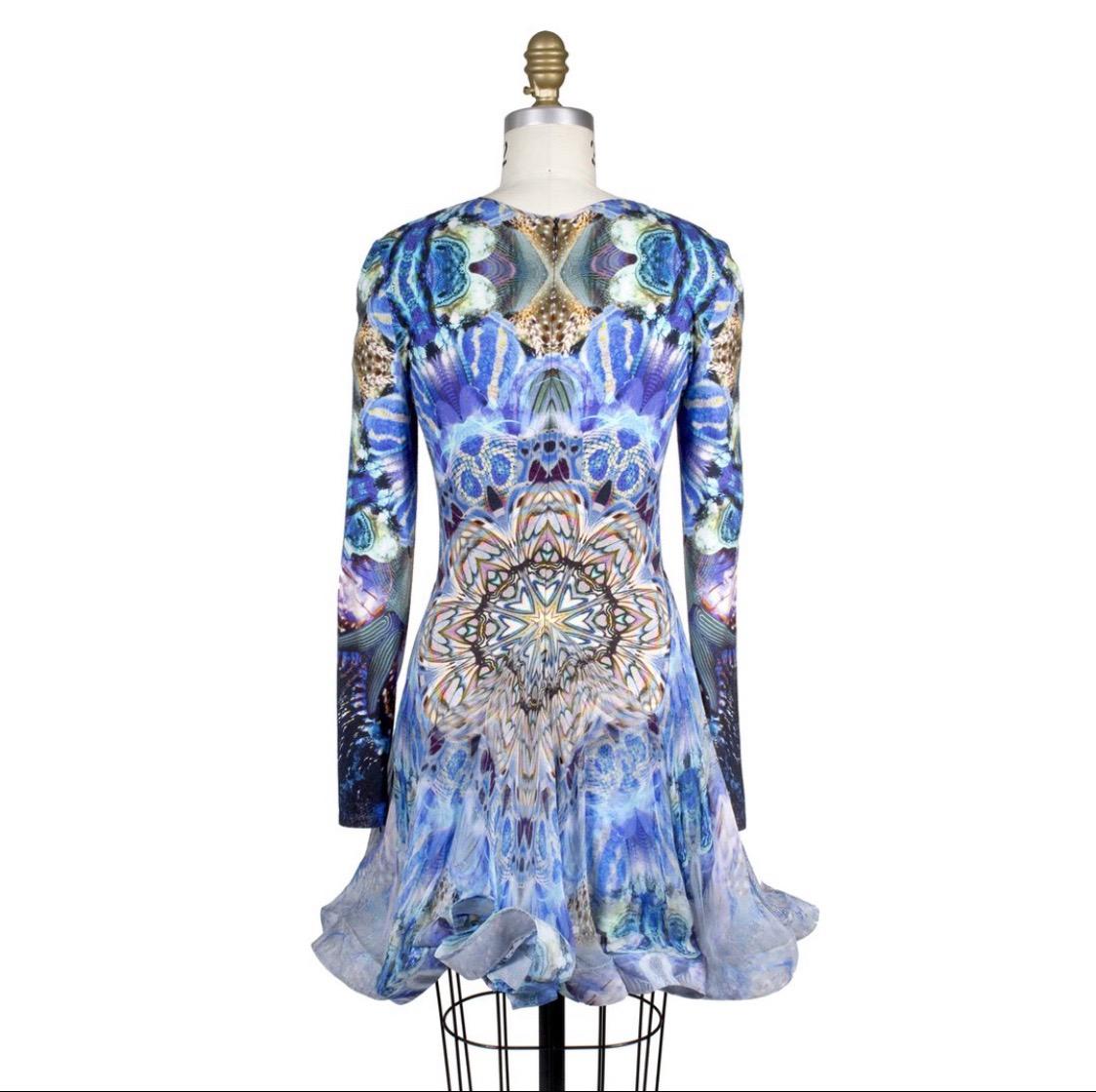This digitally printed kaleidoscope pattern dress is from Lee Alexander McQueen’s last ever presented collection “Plato’s Atlantis” of the spring 2010 season. This collection is forever cemented as a pivotal milestone in the history of fashion, as