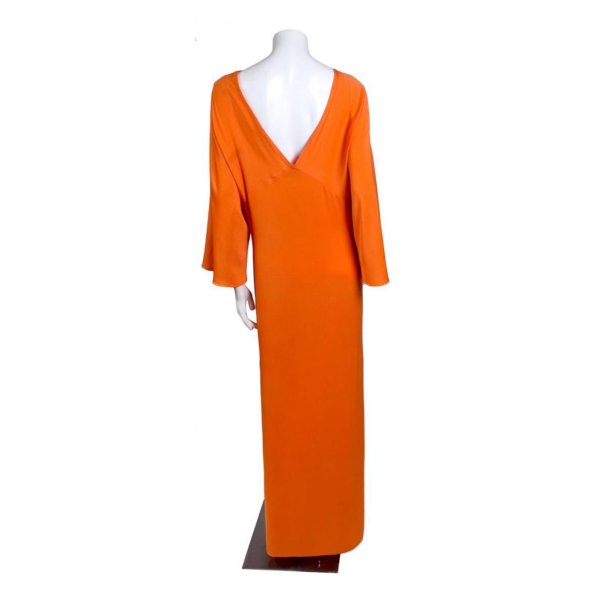 Dress by Halston circa 1970s
Bias cut
V neckline in front and back
Batwing sleeves
Side slit
Condition: Excellent vintage condition

Size/Measurements:
Can fit a size 2-8 approximately
