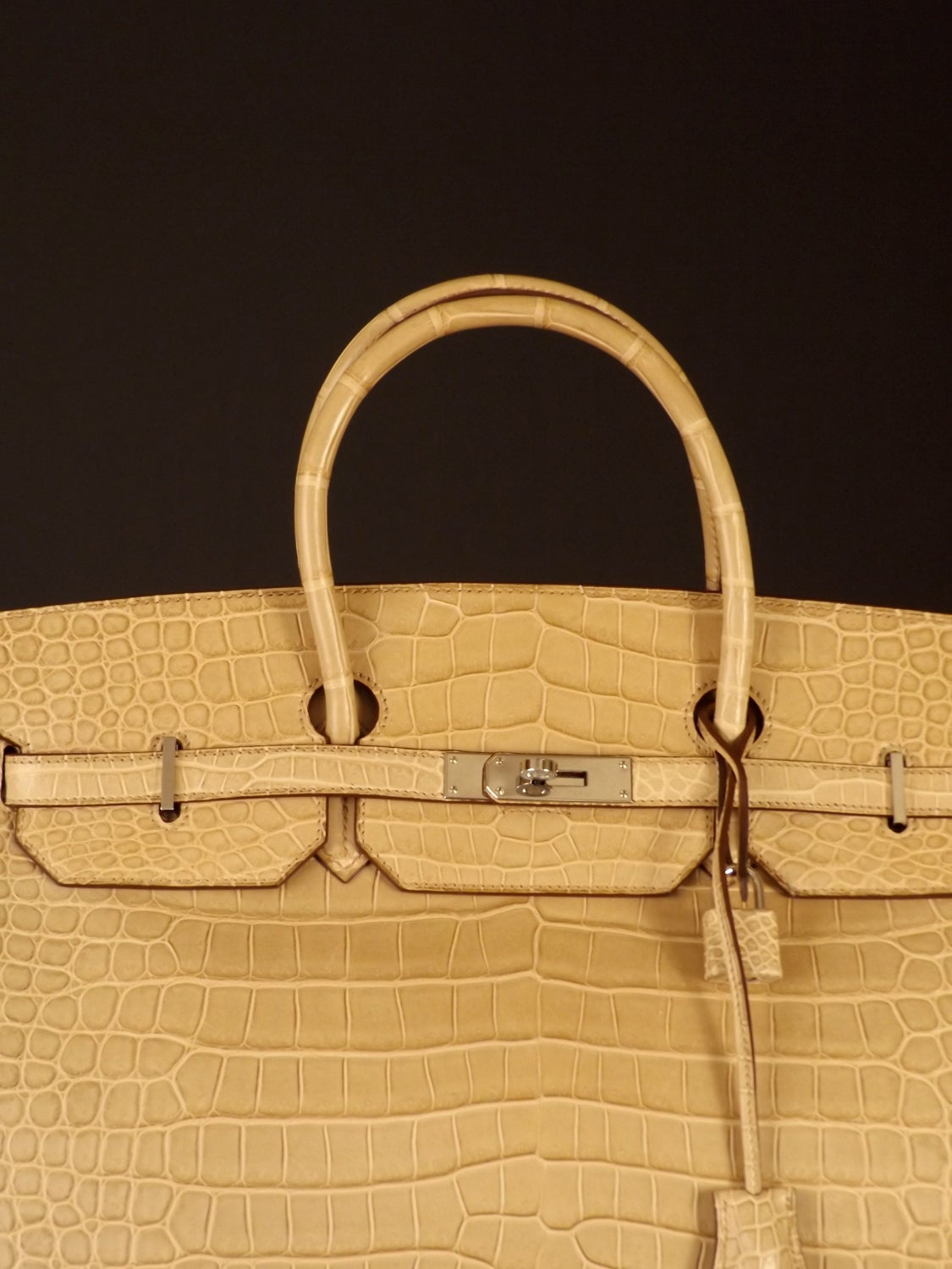 This Authentic Hermès matte Porosus Crocodile 40cm Birkin has been carried only twice and is still in immaculate condition. The bag has gorgeous markings in the skins and was a special order for my client. Everyone knows how difficult these are to