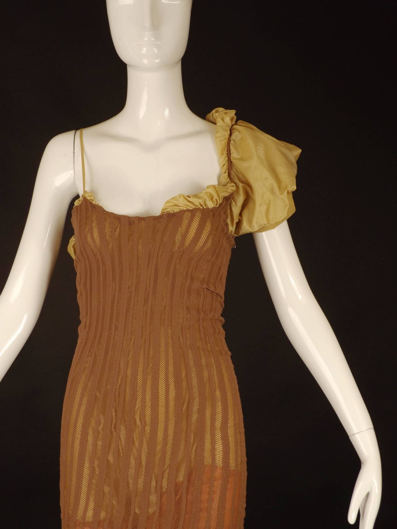 Spring, 2001 Jean Paul Gaultier runway dress in a parachute silk with a cocoa brown ribbed and clocked knit tube tee. The silk is color blocked in a golden yellow, melon and a cool shade of green. The tee is very stretchy and the silk so very