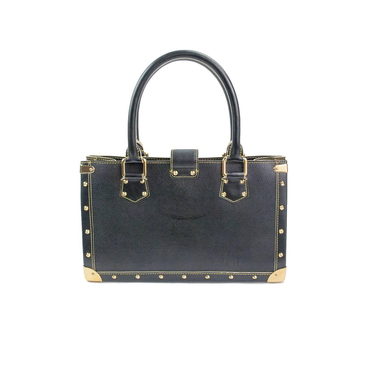 Fantastic 2003 Louis Vuitton Suhali Le Fabuleux bag
Letaher
Black color
Golden steel inserts and studs
Yellow colored stitching
External zip pocket
Double internal textile compartment divided by large zip pocket
Additional internal pocket and