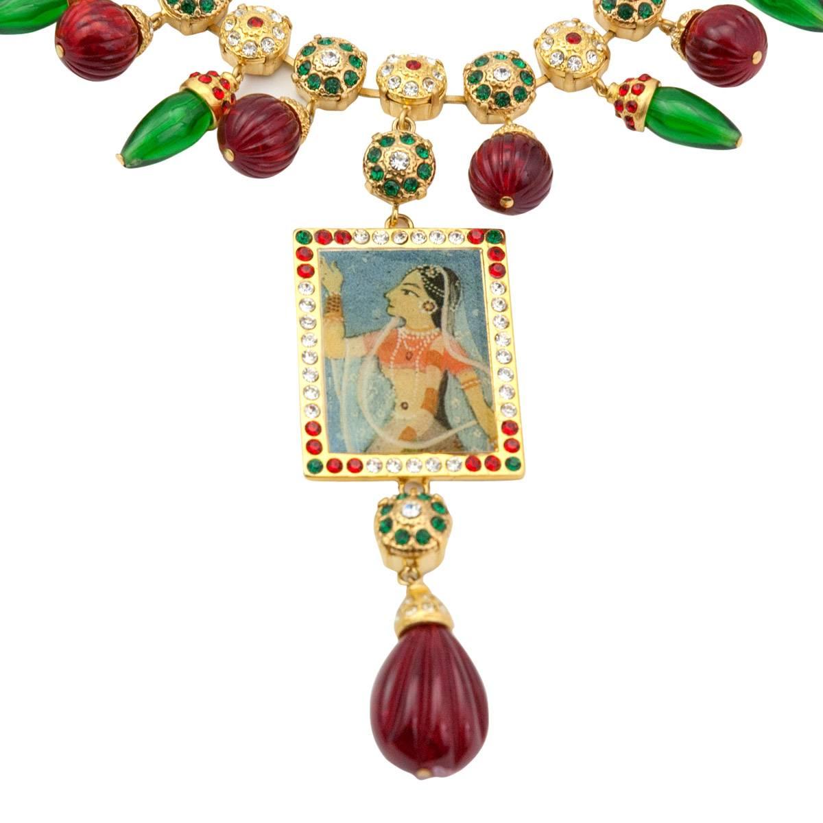 Very origina Carlo Zini necklace
India inspired
Golden brass
Swarovsky crystals
Imitation of emerald and ruby
Small red and green rhinestones
Made in Italy 
Worldwide express shipping included in the price !