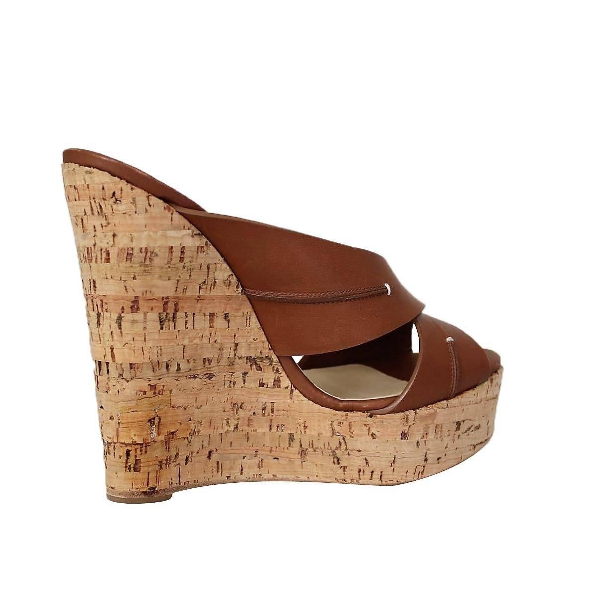 Cork wedge
Brown leather
Heel height cm 14 (5.5 inches)
Plateau cm 4 (1.57 inches)
Made in Italy
Worldwide express shipping included in the price !