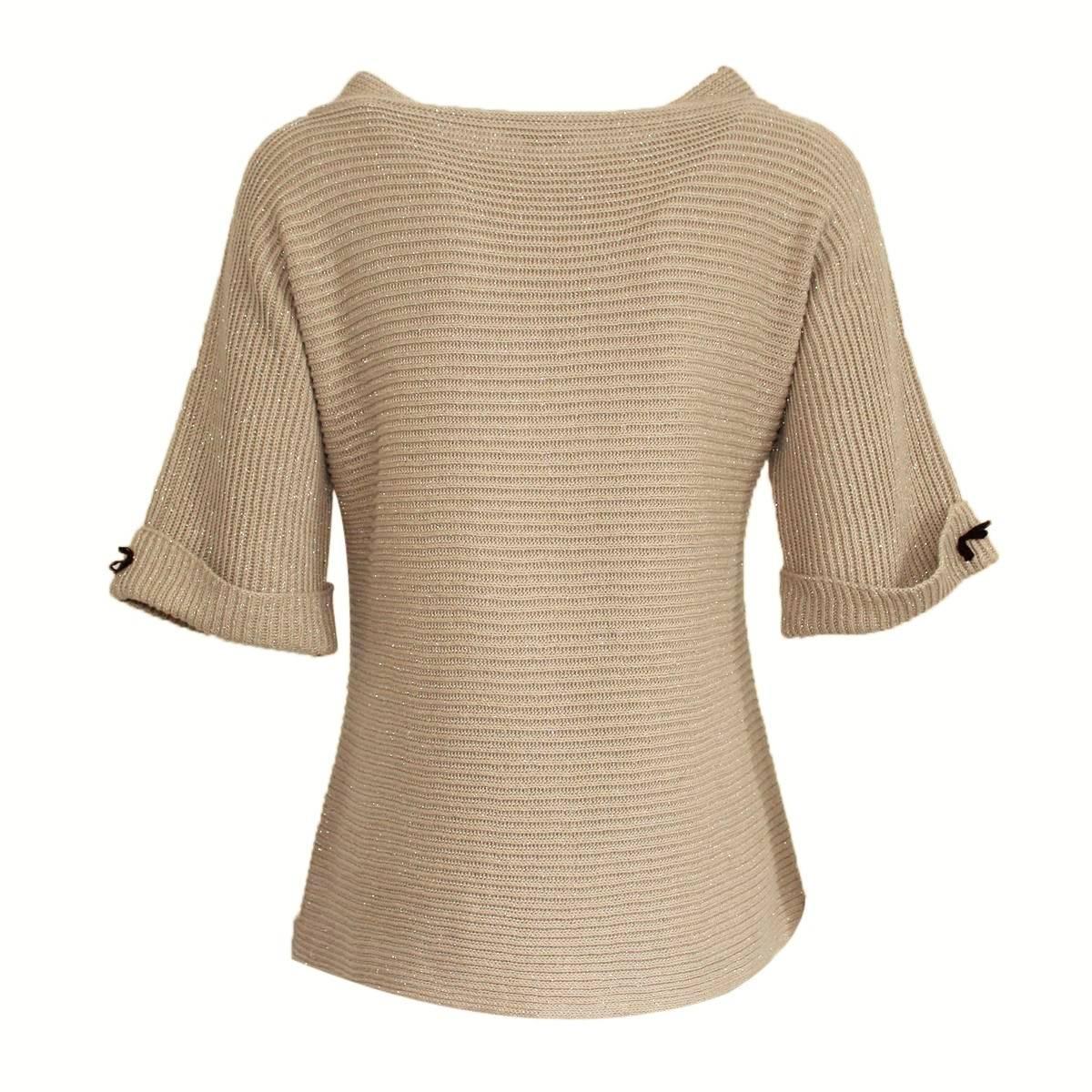 Beautiful and top quality Brunello Cucinelli sweater
Cotton and lamé
Natural color
Short sleeve
Crew-neck
Size M
Made in Italy
Worldwide express shipping included in the price 