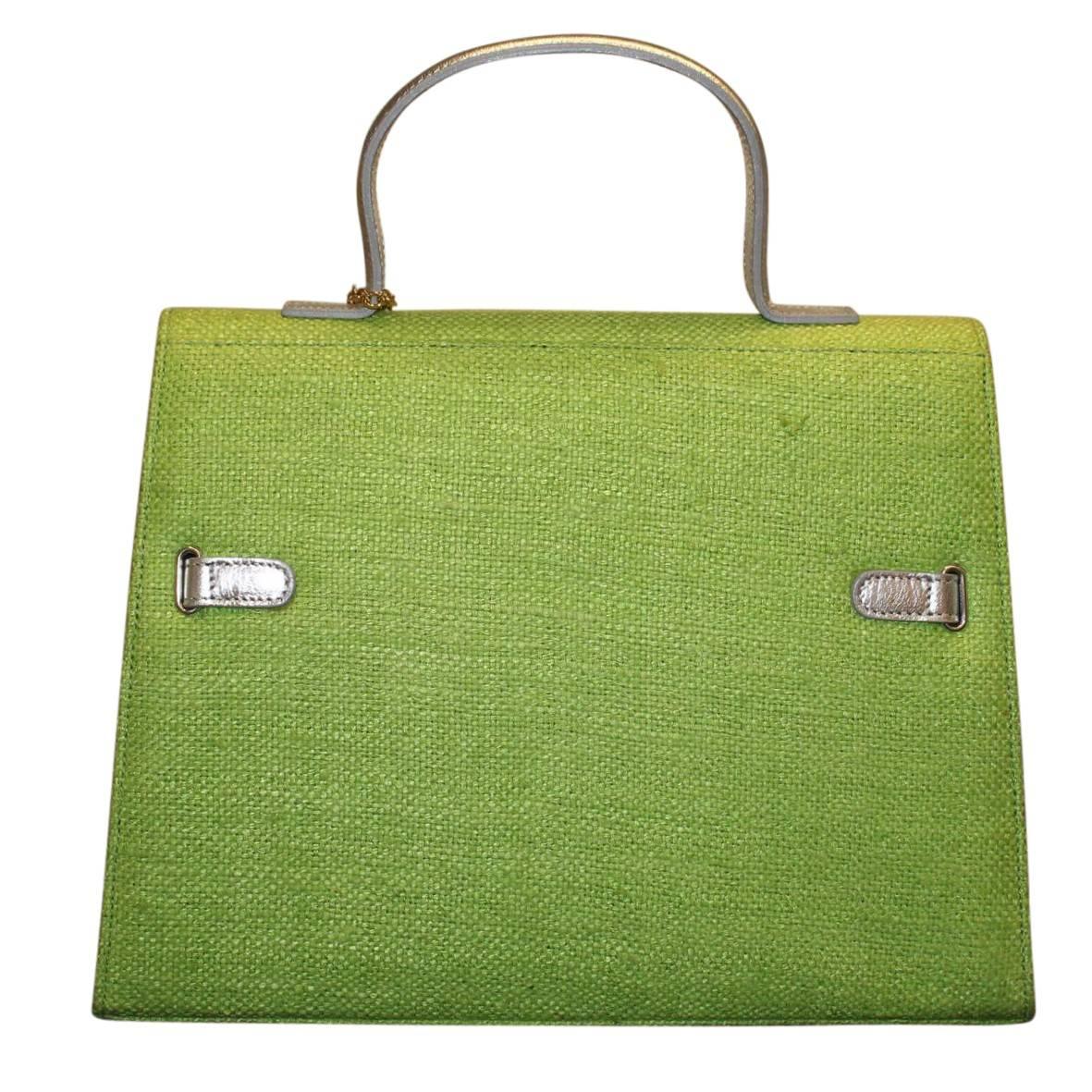 Beautiful and funny Carlo Zini Milano bag
One of the world's best bijoux desigers
Unique piece
Green textile
Wonderful metal, crystals and swarovsky applications
Crocodile pattern
Silver colored leather handle
Internal zip pocket
Can be