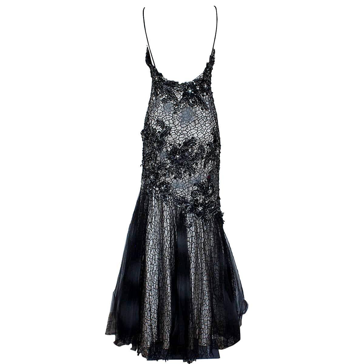 Fantastic dress by Gribha International
Long dress
Amazing work of tulle, net and sequins
Black and grey colors
With undervest
Total lenght cm 125 (49.2 inches)
Made in France
Worldwide express shipping included in the price !
