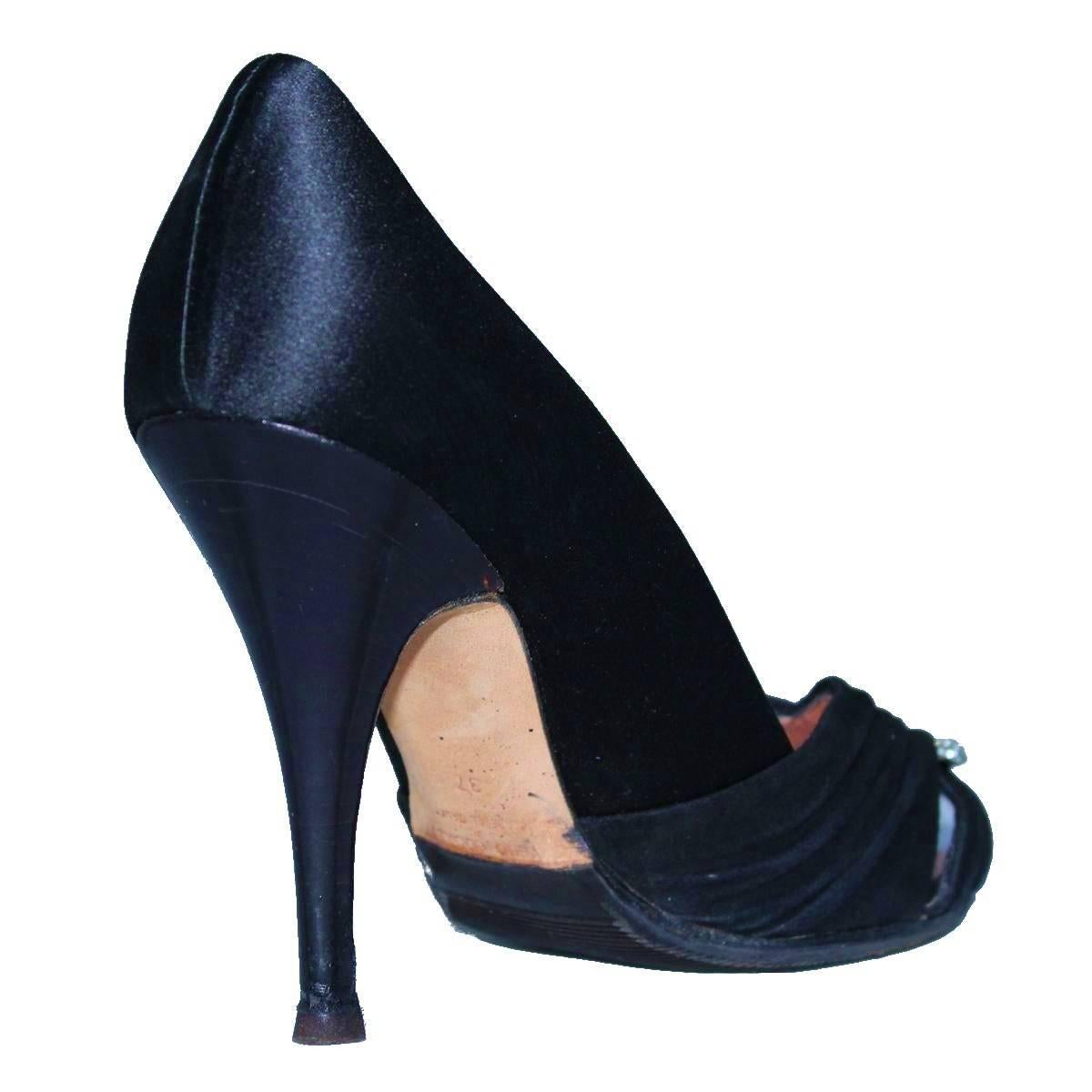Beautiful pair of Giuseppe Zanotti Design open toe décolleté
Satin and buckskin
Black color
Applied rhinestones
Heel height cm 10 (3.93 inches)
Rubber antislip sole applied lately
Size 37 
Made in Italy
Worldwide express shipping included in the