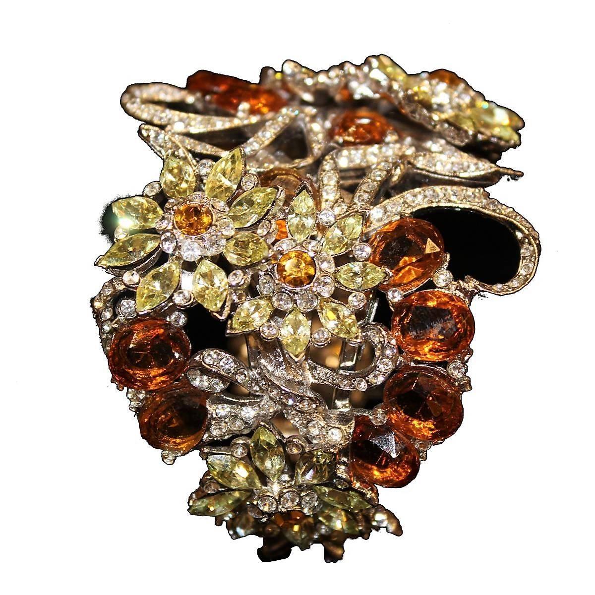 Amazing Carlo Zini bijoux Milan bracelet
One of the world's best bijoux designers
Non allergenic rhodium
Amazing hand creation of crystals and colored rhinestones
Floral theme
Maximum width cm 6 (2.36 inches)
Wrist size cm 17 (6.7 inches)
Unique