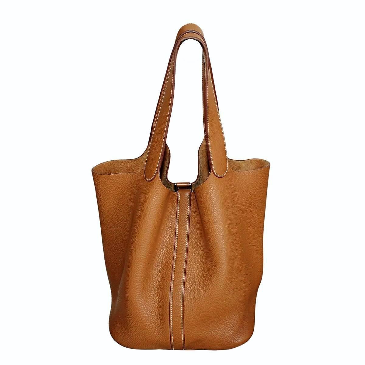 Fabulous creation from Hermes, adored by celebrities 
Brandy / camel color Clemence leather with palladium hardware
Two handles
Internal suede
Cm 26 x 26 x 21 (10.5 x 10.5 x 8.5)
Very good overall conditions (perfect internal, very small signes on
