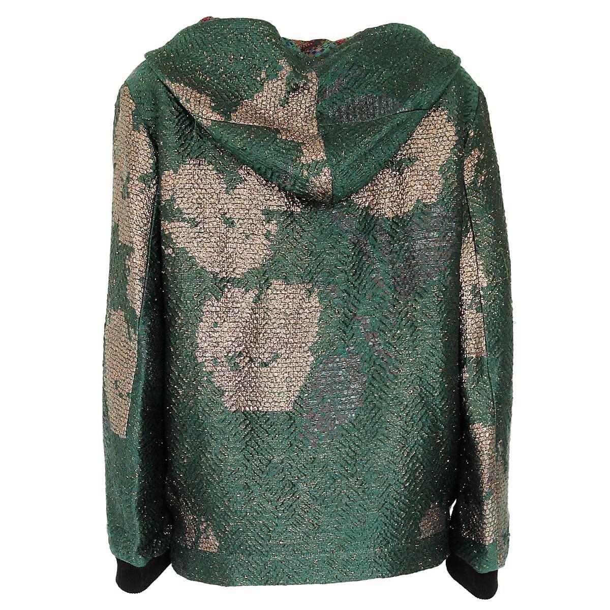 Reversible bomber
Mixed textile (40% linen)
Green and gold in one side
Green and bordeaux fancy pattern on the other
Embossed textile
Two pockets for each side
Zipl closure
With hood
Length from shoulder cm 62 (24.4 inches)
Original price €