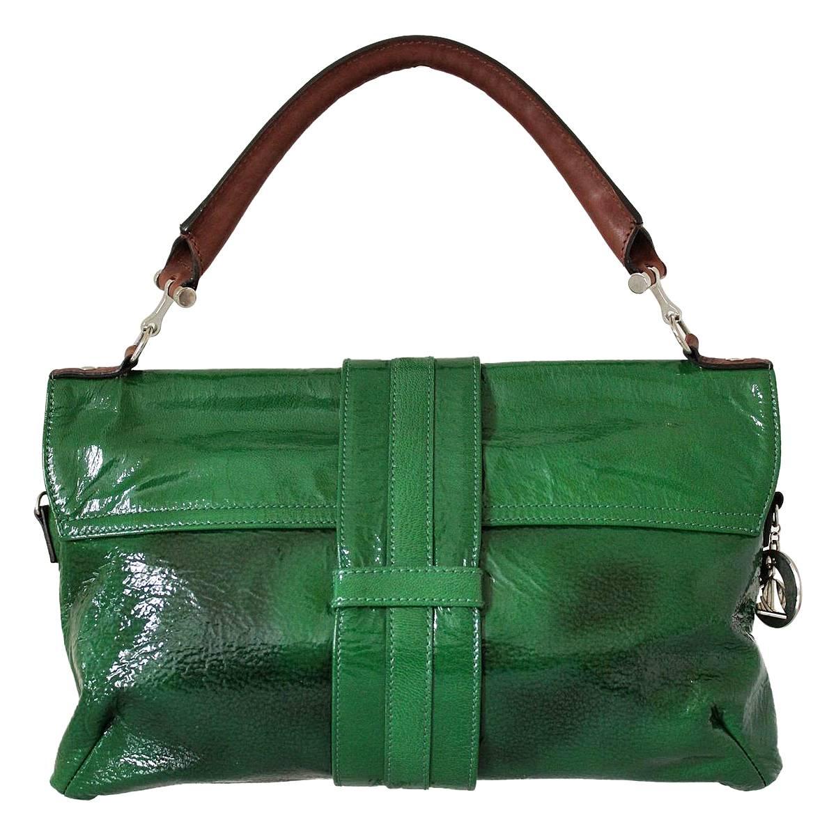 Beautiful and amazing color for this Lanvin handbag
Patent leather
Shaded green color
Brown leather handle
Two zip pocket
Cm 33 x 20 (12.9 x 7.8)
Made in Italy
Worldwide express shipping included in the price !