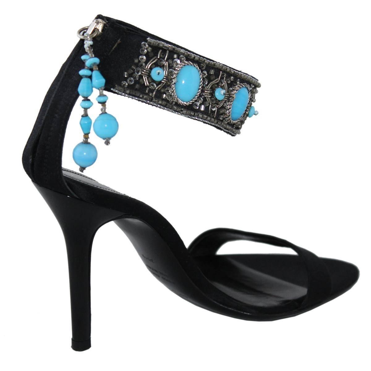 Beautiful pair of sandals by Sergio Rossi
Textile
Black color
Adorned with turquoise colored resins
Heel height cm 10 (3.93 inches)
Made in Italy
Worldwide express shipping included in the price !