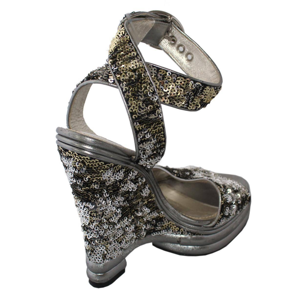 Shiny and super cool Dolce & Gabbana high sandal
Sequins
Silver color
Two buckles
Heel height cm 15 (5.9 inches)
Plateau height cm 4 (1.57 inches)
Made in Italy
Worldwide express shipping included in the price !