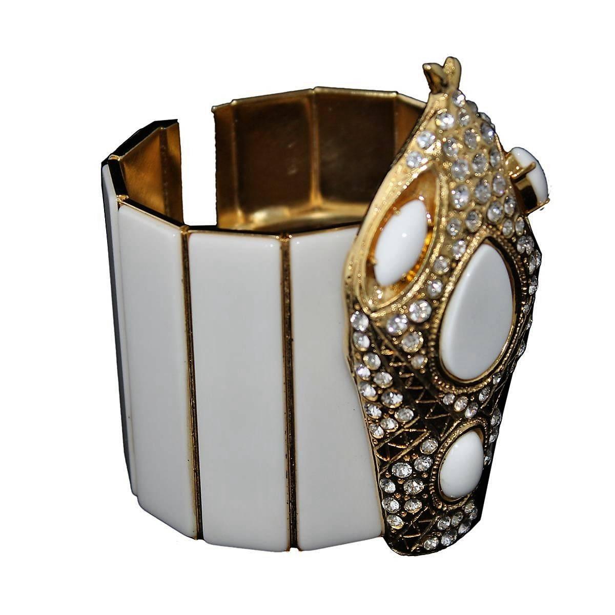 Wonderful bracelet by Carlo Zini
One of the world's greatest bijoux designers
Non allergenic rhodium
Gold dipped
Amazing hand creation of crystals and white resins
Total width cm 6,5 (2.55 inches)
Wrist cm 17 (6.69 inches)
Snake length cm 10 (3.93