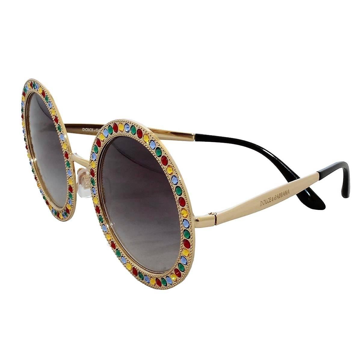 Fantastic and glamour pair of Dolce & Gabbana sunglasses
DG 2170 B Mambo
Golden metal frames
Round dark lenses
Multicolored swarovsky crystals
14 Cm width
Brand new with case and box
Made in Italy
