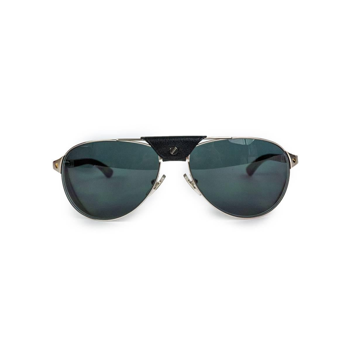 Spectacular and iconic sunglasses by Cartier
Santos Dumont Aviator 130 b edition
Dark lenses
Beautiful frame made by steel and wood
Come with original rigid Cartier case
Original price € 1400 (1500 $)
Made in France 
Worldwide express