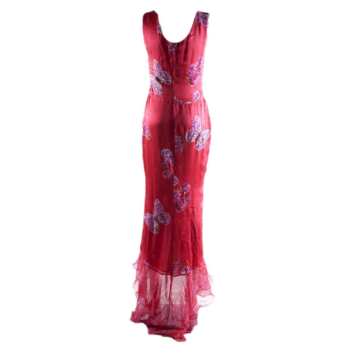 Amazing cocktail dress by Emanuel Ungaro Paris
100% Silk
Silk lining
Fuchsia color
Superb embroidery with sequins
Butterflies and flowers pattern
Shades of silk voile at the bottom
Size french 38 (Italian 42 - Us 8)
Worldwide express