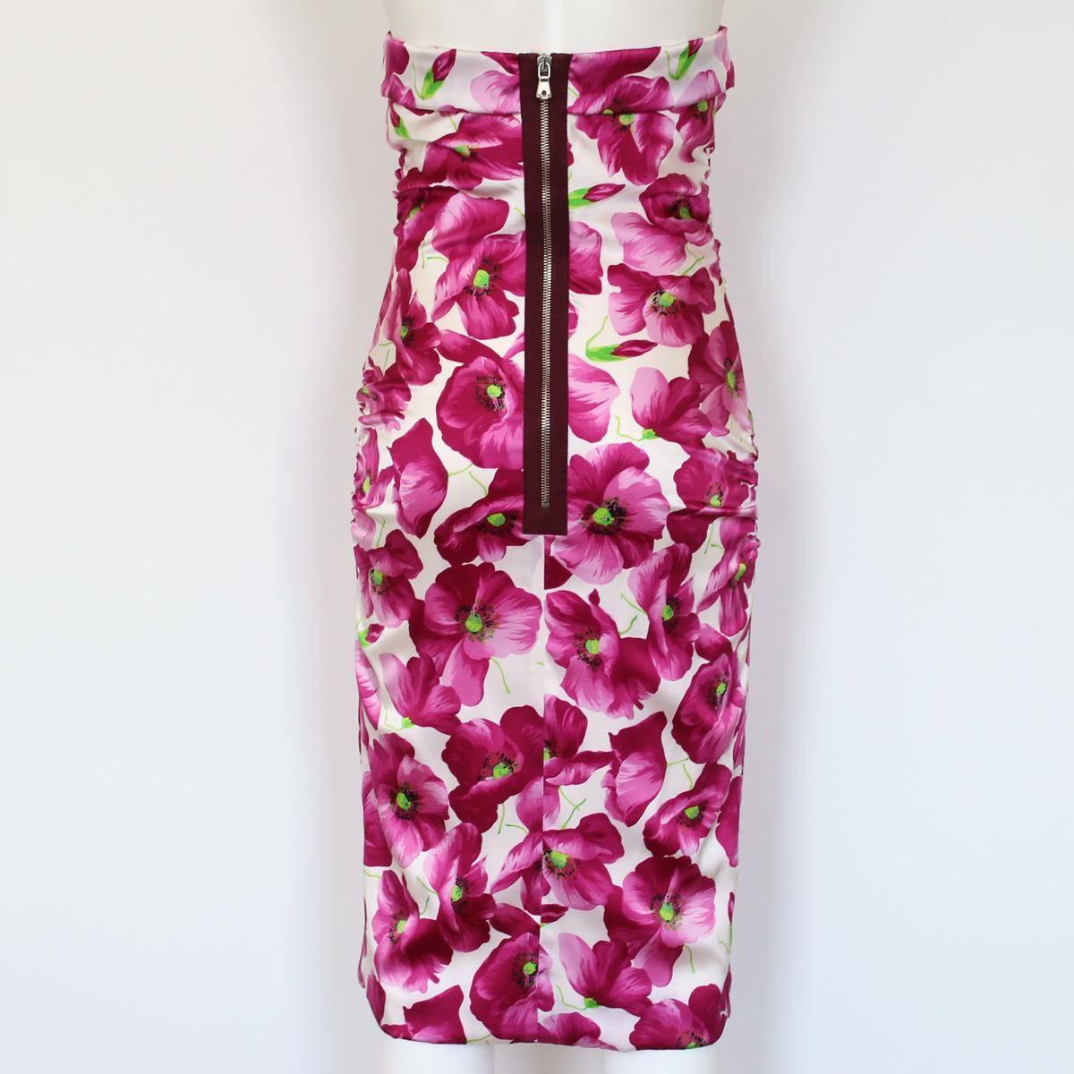 Beautiful  Dolce & Gabbana dress
Floral dress
Silk
Floral pattern
Fuchsia color
Zip on back
Total lenght cm 80 (31.4 inches)
Made in Italy
Worldwide express shipping included in the price !