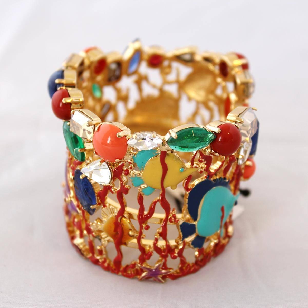 Stunning piece by Carlo Zini Milano
One of the greatest world fashion jewelry designers
Marine pattern
Fantastic work of hand painted elements, golden metal, swarovski crystals and stones
Non allergenic 
18 KT gold dipped (3 micron)
Wrist cm 17