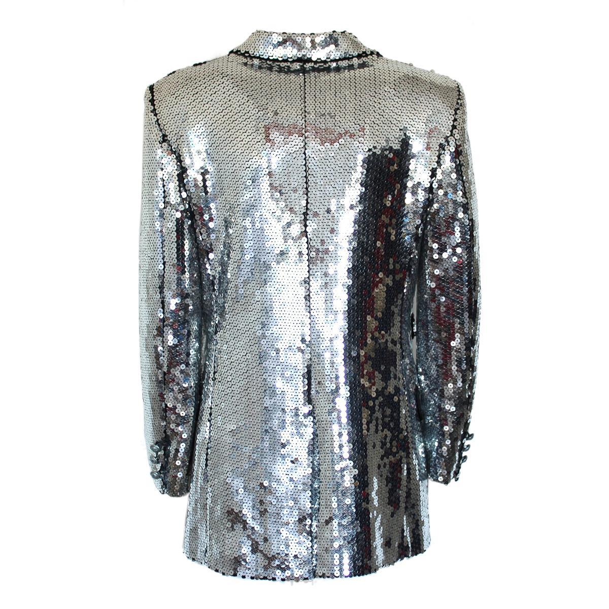 Rare and exclusive piece
Moschino Cheap and Chic
Vintage of early 90's
Sequins
Silver color
Four pockets
Three authomatic buttons
Length from shoulder cm 67 (26.3 inches)
Worldwide express shipping included in the price !