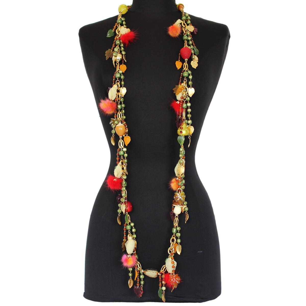 Fantastic masterpiece by Carlo Zini
One of the world greatest bijoux designers
Long necklace that can be worn in double round too
Stunning construction of autumn fruits elements linked in golden chain and adorned with swarovski crystals
Colored real