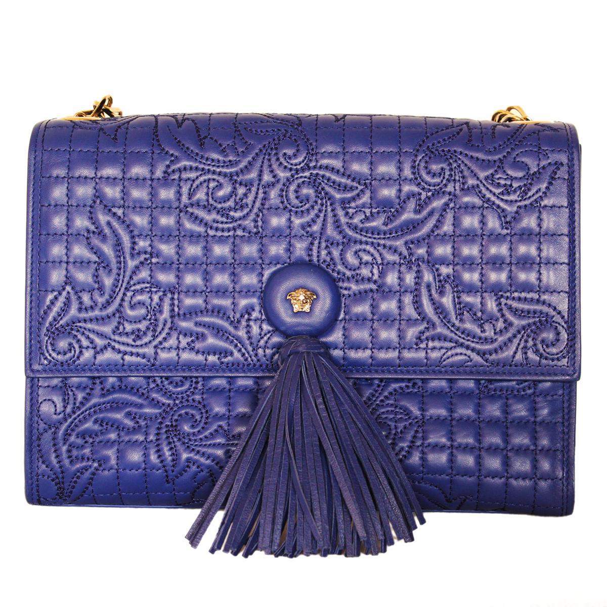 As new, fantastic Versace bag
Matelassé leather 
Baroque pattern
Blue China
Golden chain
CButton closure with frings
Double internal pockets (one with zip)
Cm 28 x 22 x 10  (11 x 8.6 x 3.9 inches)
Worldwide express shipping included in the price !