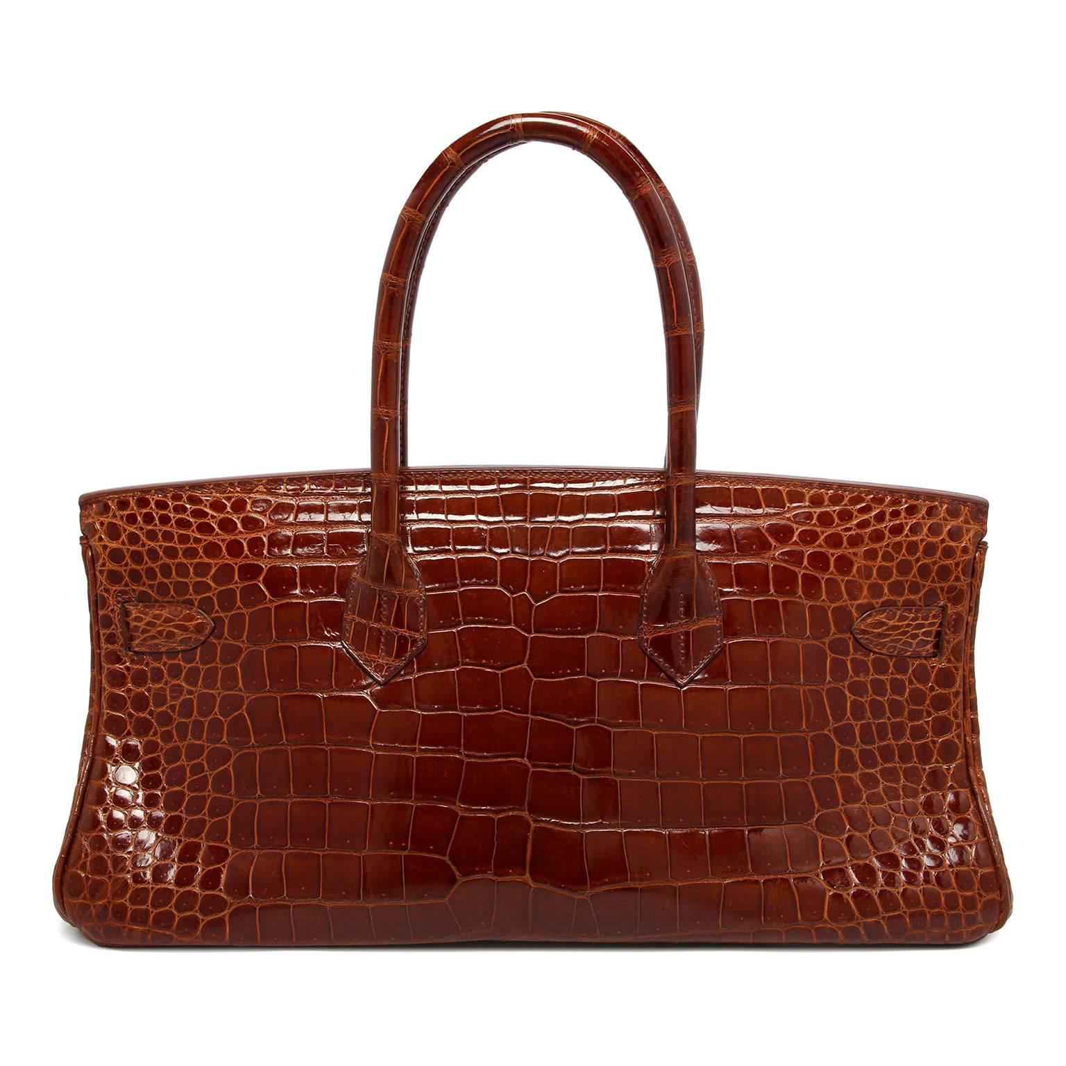 Limited edition
Hermes Jean-Paul Gaultier shoulder Birkin 
Miel Shiny porosus croc 
Palladium hardware 
Stamp: I Square 2005
Comes with Hermes cloth bag, clochette, lock & key.

Very few of this style were made in croc so this is a true
