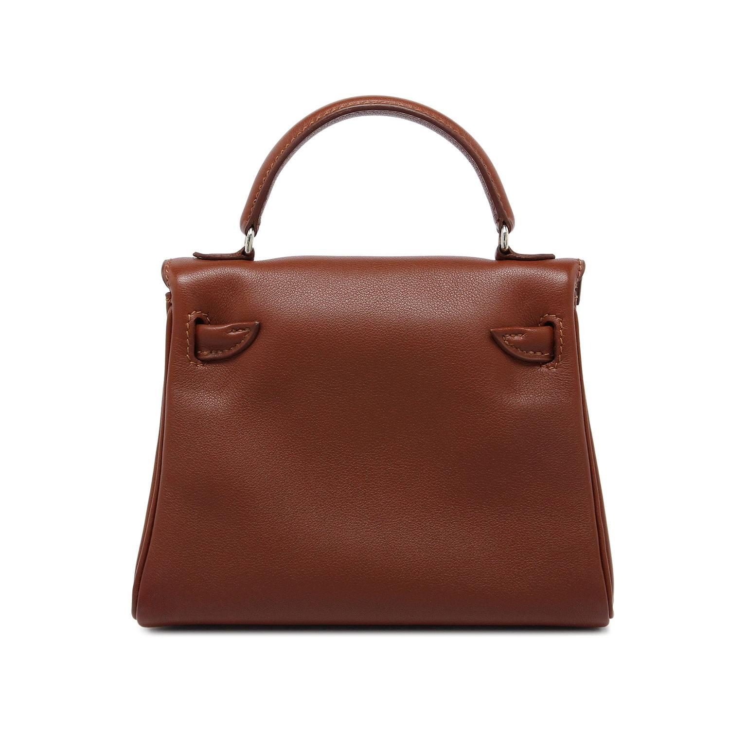 Limited edition Hermes Kelly Doll 16cm 
Brown 
Gulliver leather
Stamp: D Square 2000
Comes with Hermes cloth bag.
(Hermes did not make a strap, clochette, lock & keys for this style bag).

This is a cute collectors piece.
