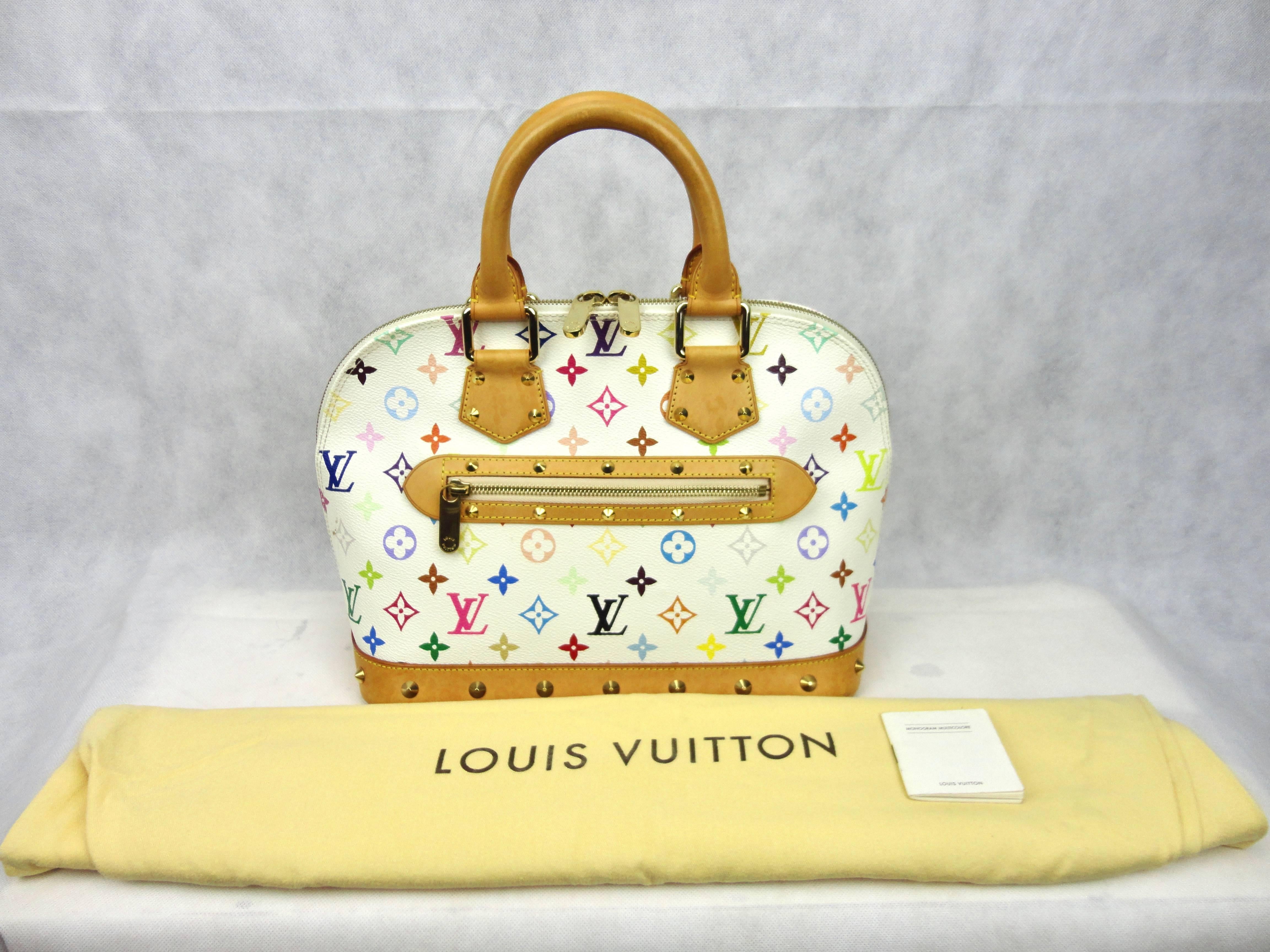Louis Vuitton Alma Handbag Monogram Multicolor is a versatile structured bag that complements both dressy and casual look perfect for the modern woman. Designed in Takashi Murakami's famous white monogram multicolor print coated canvas, this