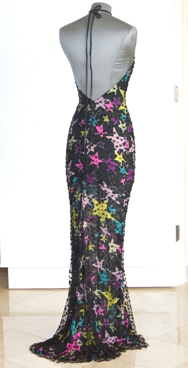 GIANNI VERSACE COUTURE stunning long dress.  Fabulously flattering and vibrant colour.
Halter style with a low back.
The upper is a delicate black lace with small black beads throughout.
The ties around the neck are encrusted with black