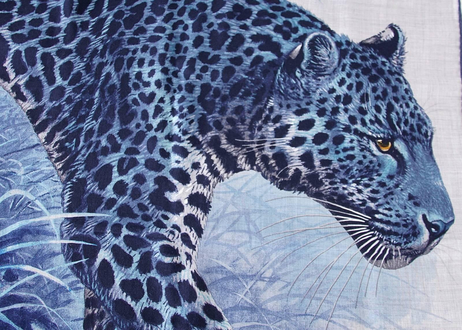 Guaranteed authentic HERMES Limited Edition PANTHERA PARDUS Cashmere/Silk large scarf/shawl.
Stunningly  beautiful coveted reissued Robert Dallet shawl with signature hand rolled edge.
In shades of blue with grays, this shawl depicts a panther in