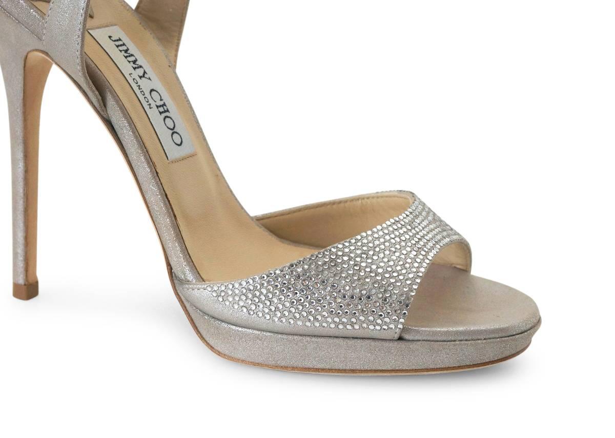 Guaranteed authentic Jimmy Choo soft silver shoe with diamante encrusted straps.
Zips at heel.
Divine stiletto silver heel. 
NEW or NEVER WORN.  
final sale

SIZE  39
USA SIZE  9

SHOE MEASURES:
UPPER SOLE  10
