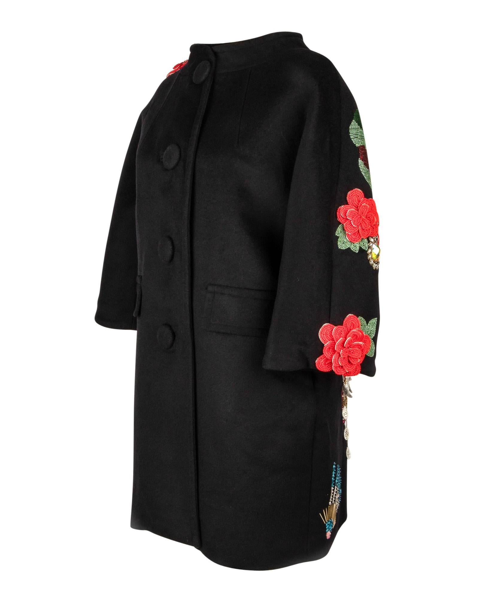 Guaranteed authentic Libertine Unisex black coat that is over the top show stopping with remarkable embellishment.
Large rear bead and diamante embellished skull intricately created with beading and diamantes in varying shapes and sizes.  