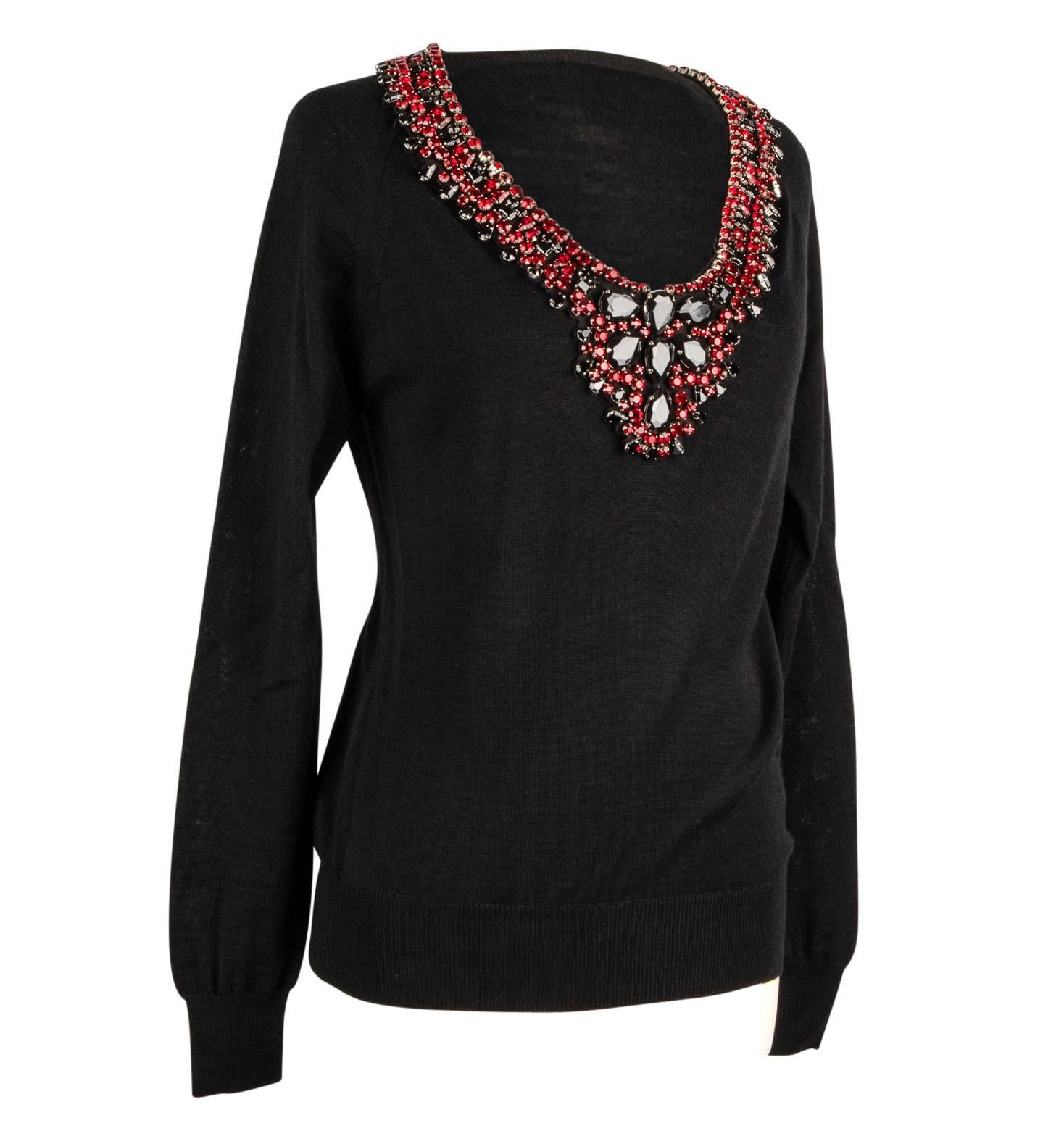 Guaranteed authentic Philipp Plein Couture jet black jeweled sweater. 
Rounded V neck encrusted with faceted stones of black and red in various sizes and shapes.
Dramatic effect!
Light weight classic knit top.
Fabric is wool and acrylic.
final