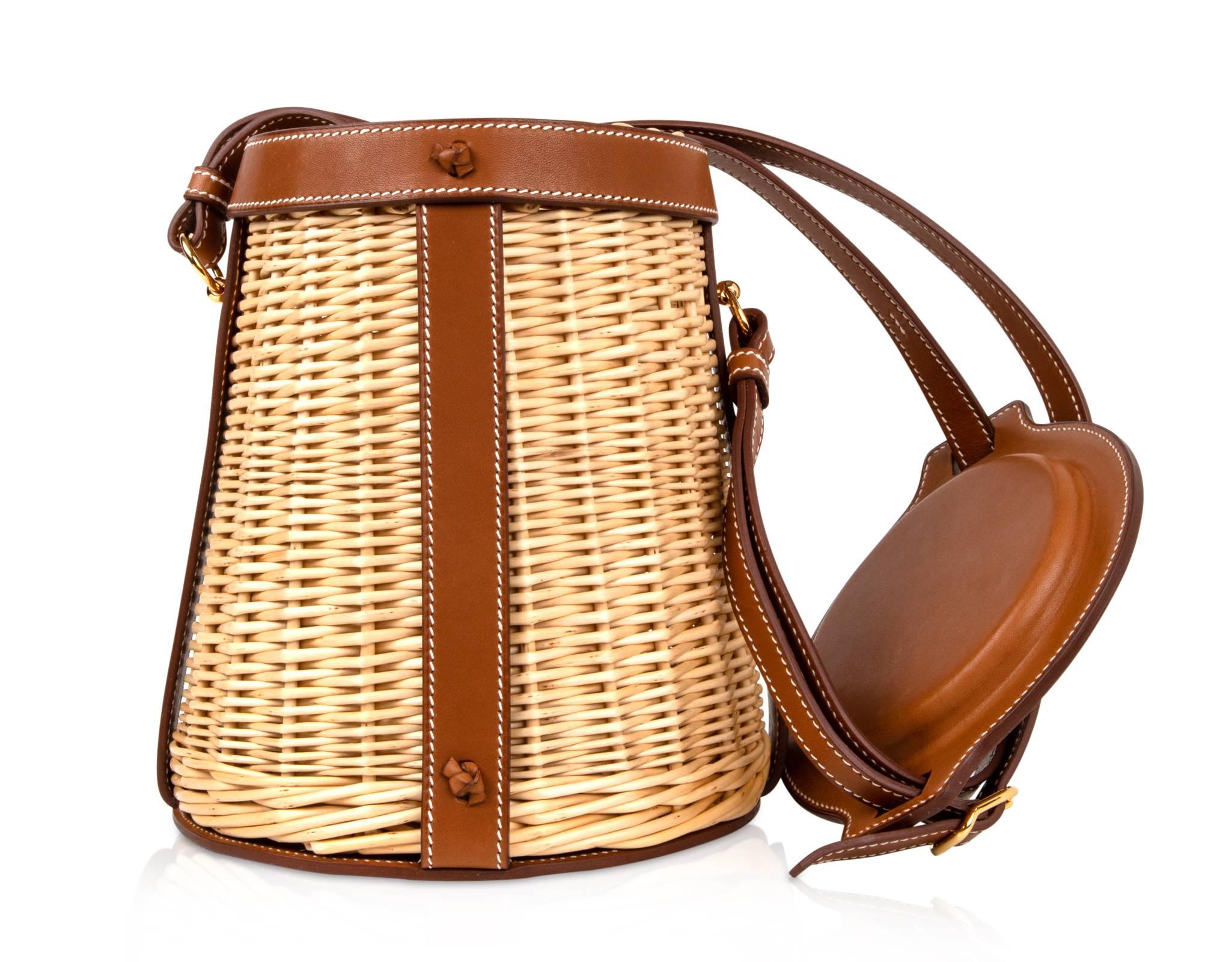 Hermes Farming Picnic Bag Osier (Wicker) Barenia Rare Limited Edition created Spring/Summer 2015.
The ultimate chic bag for any summer day - dress her up or down.
Beautifully accented with coveted Barenia leather with signature bone top